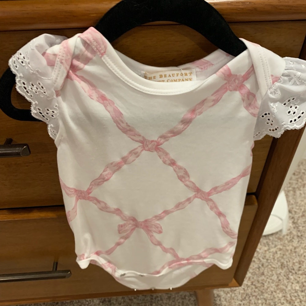 The Beaufort Bonnet bow onesie